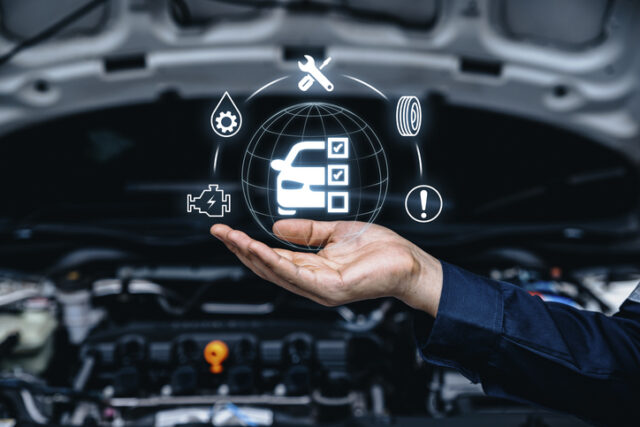 Hand of mechanic holding car service Mercedes Benz lemon law attorney in san diego california